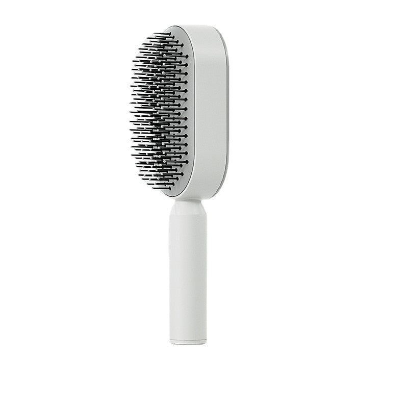 Cepillo de pelo antiestático autolimpiante