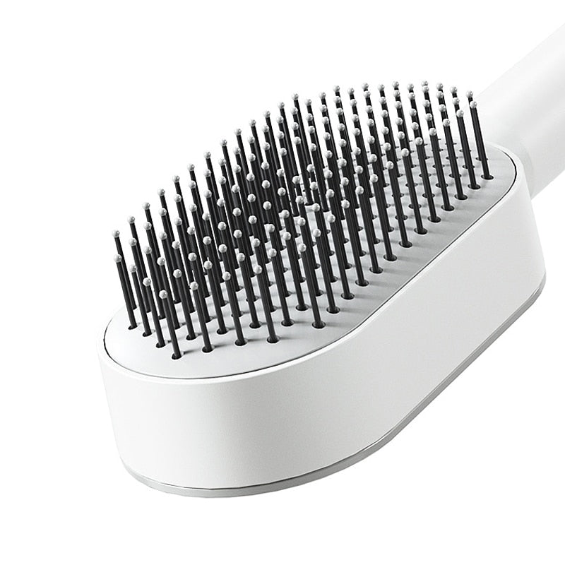 Cepillo de pelo antiestático autolimpiante